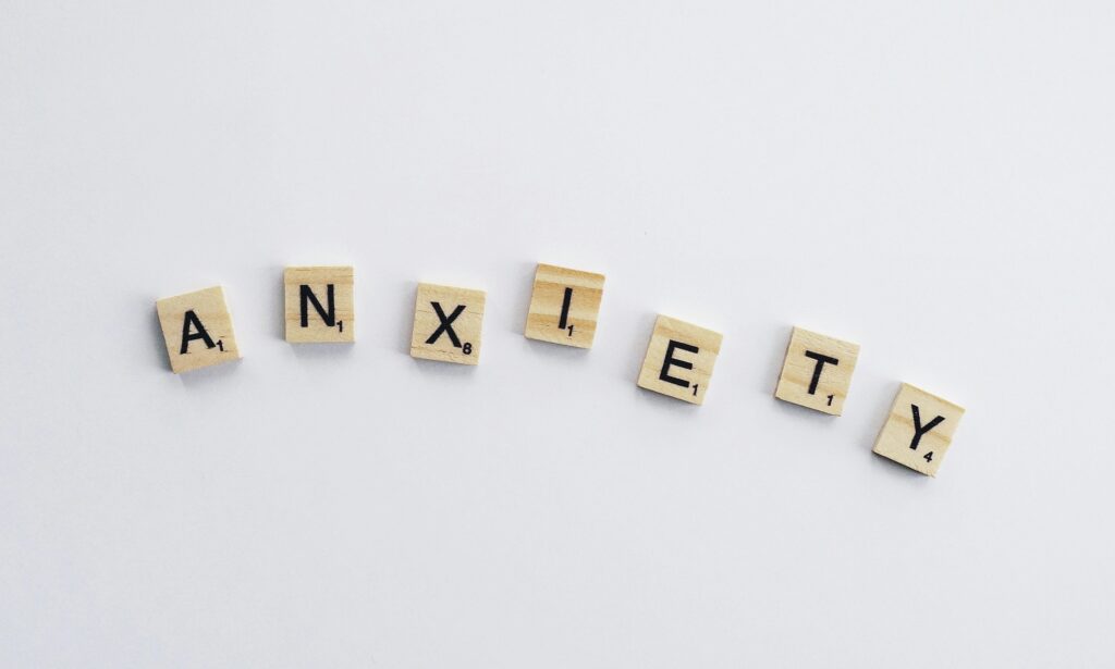 wood blocks spelling out anxiety