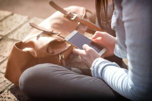 Person scrolling on phone
